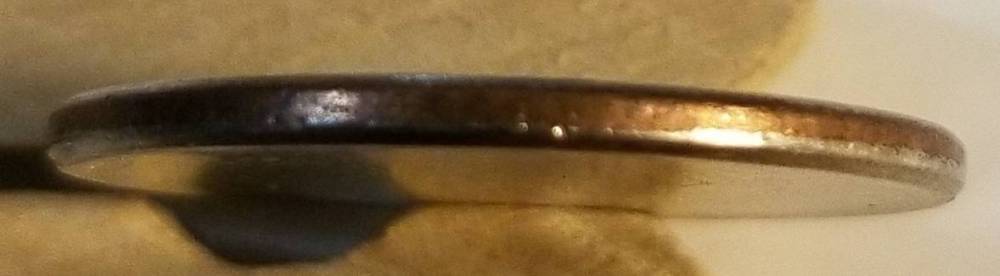 Is-This-A-Real-Blank-Quarter-Planchet?